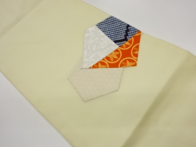 絽絞り切り嵌め丸文に花唐草模様名古屋帯